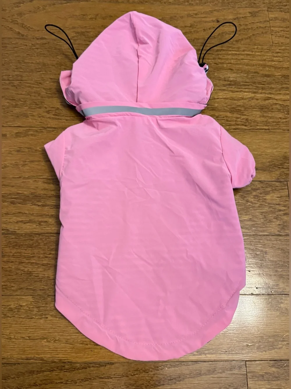 OKpangcho dog raincoat (pink, size M). Features a detachable hood, making it a v